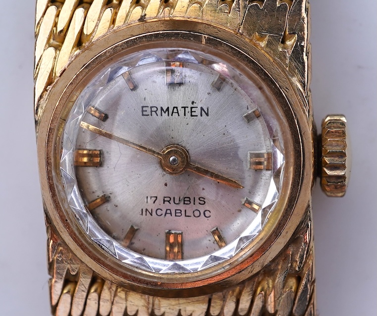 Ermaten, a gold watch